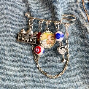 Silver Travel Charm Brooch with Red, Blue & Yellow Accents